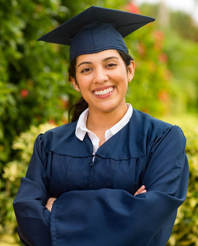 Young hispanic female graduate at her graduation